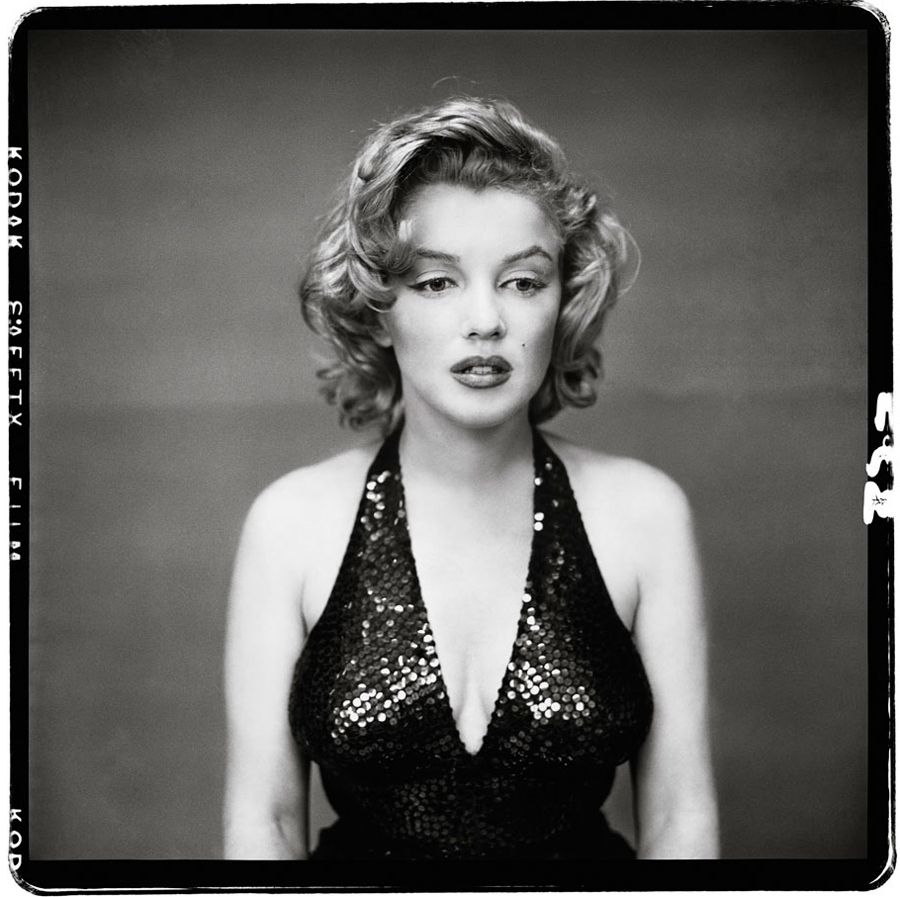 Richard Avedon is famous for aiming to break celebrities' public façade and capture their inner personality. Remembering a portrait session with Marilyn Monroe that took place in his studio in 1957, he said: “For hours she danced and sang and flirted and did this thing that’s—she did Marilyn Monroe. And then there was the inevitable drop. And when the night was over and the white wine was over and the dancing was over, she sat in the corner like a child, with everything gone. I saw her sitting quietly without expression on her face, and I walked towards her but I wouldn’t photograph her without her knowledge of it. And as I came with the camera, I saw that she was not saying no.” Avedon was waiting for the real Marilyn to emerge and he was able to capture a glimpse of who she really was.