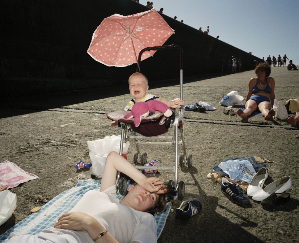 Photo by Martin Parr. Martin Parr is famous for his irony in showing simple society behaviours. Remember: breaking the rules can create an interesting image.