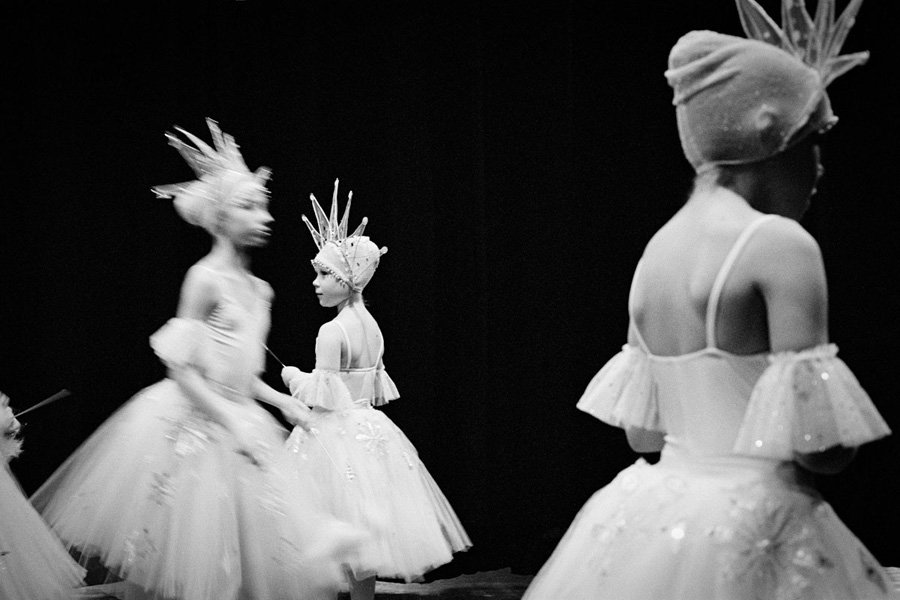 Ballerinas from the Brighton Ballet Theater, School of Russian Ballet in New York, on the stage of the Colden Auditorium at Queens College during the performance of The Nutcracker. The BBT presented a holiday performances of “The Nutcracker”, an original ballet based on the timeless story of Ernst Hoffmann and Tchaikovsky's classic score. Choreographed by Edouard Kouchnarev, a new generation Russian choreographer who has danced and choreographed throughout the world, the BBT production is a charming introduction to ballet and to the classic tale of a magical night when a young girl sees the Nutcracker and other toys come to life in her living room. New York, December 2011. (Photo by Viviana Peretti).