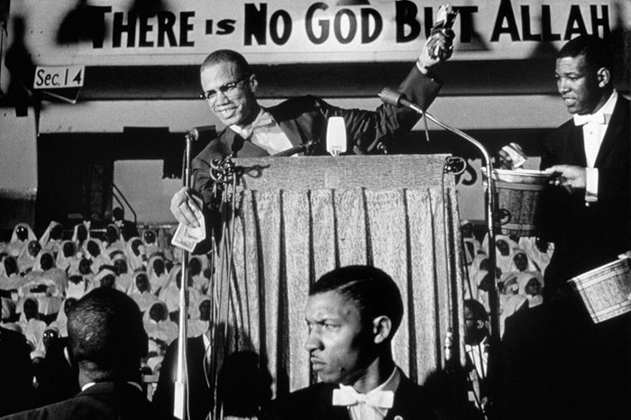 Magnum Malcolm X gives a speech at a Nation of Islam rally, Washington, D.C., 1961 by Eve Arnold (c) Magnum Photos
